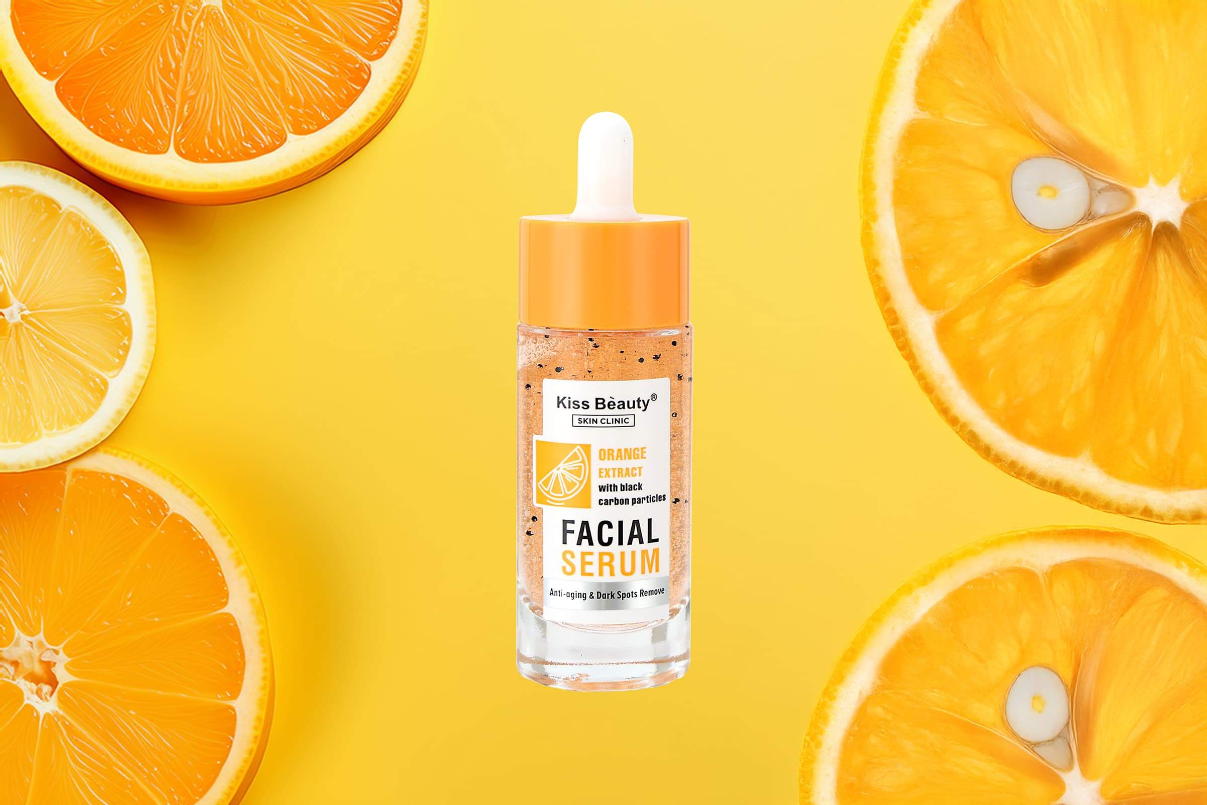 مصل الوجه البرتقالي معبأ بفيتامين سي وبطع الحمضيات